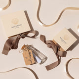 Eco-friendly jewellery gift packaging from Rockpool Jewellery with cream boxes, grosgrain ribbon, and coastal-inspired thank-you message
