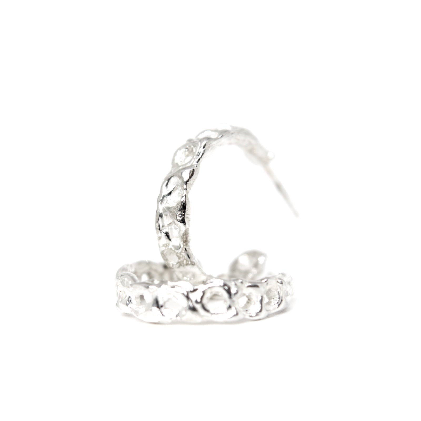 Handmade sterling silver reef-inspired hoop earrings with textured ocean design, perfect for everyday or occasion wear