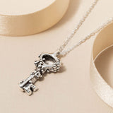 silver-key-pendant