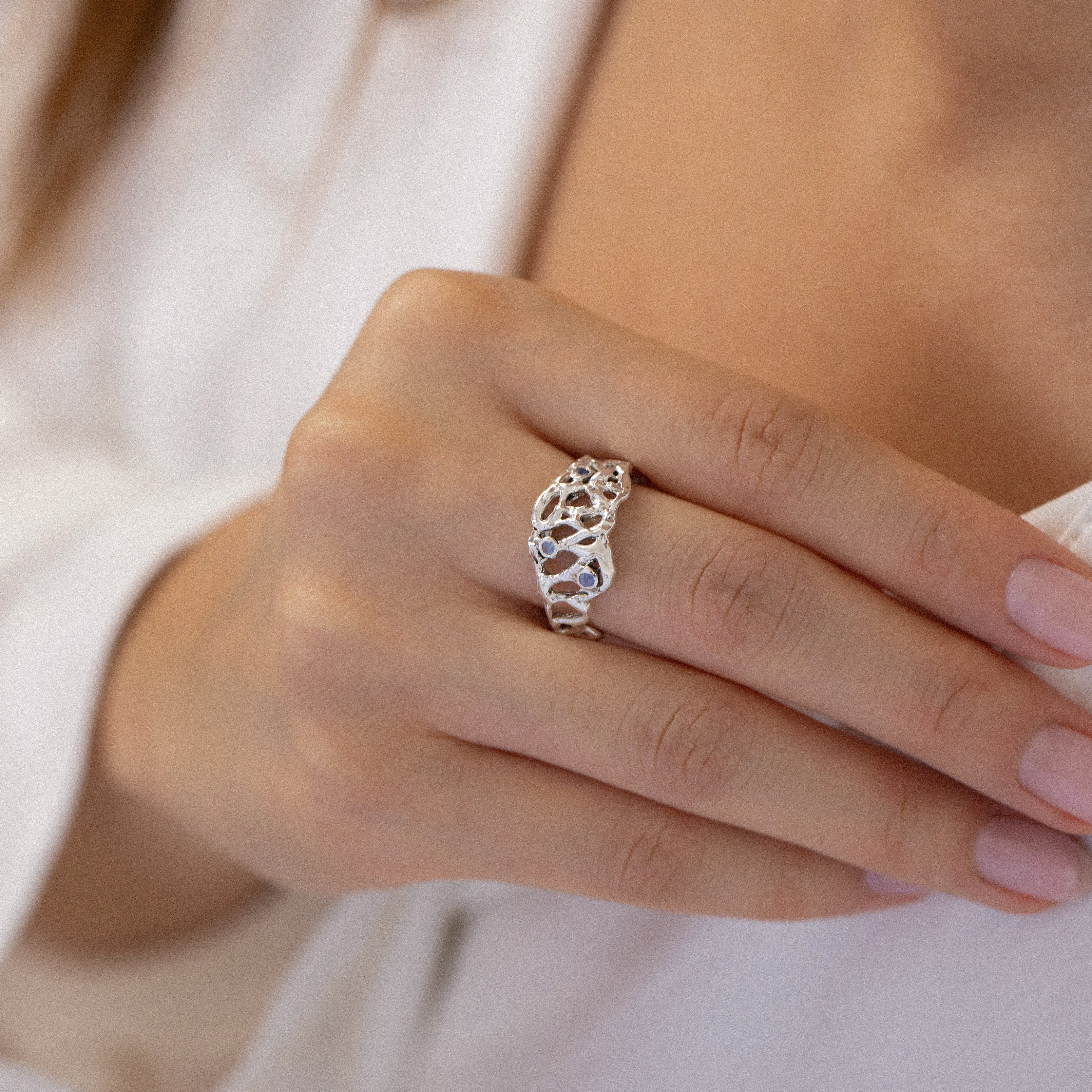 Coral inspired silver ring with blue sapphires 