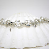 Handmade sterling silver mariners link chain bracelet inspired by coastal textures and rippling water, chunky small link bracelet from Sandbank Collection by Rockpool Jewellery